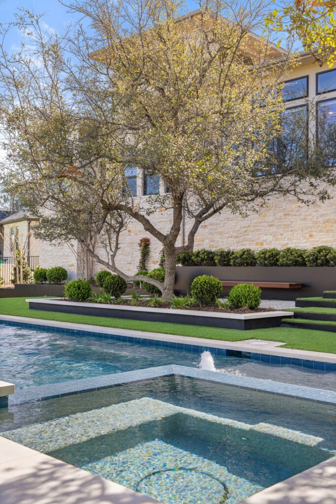 Tanning ledge spa and fountain detail – The Axis Wild Basin Pools Austin TX